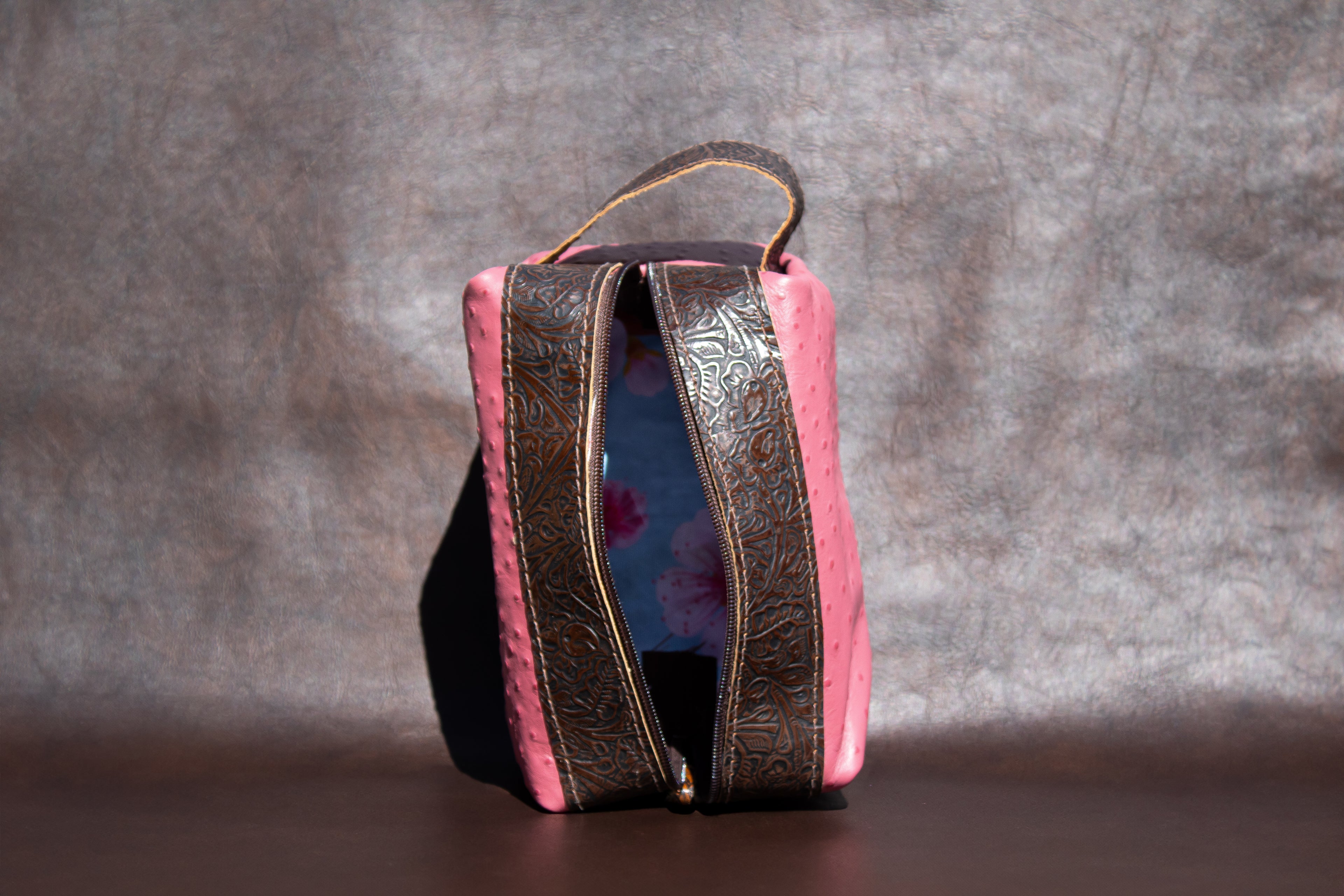 Pink ostrich leather dopp kit/toiletry bag with brown embossed leather